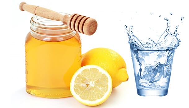 Warm Water Flavoured With Honey And Lemon Mix